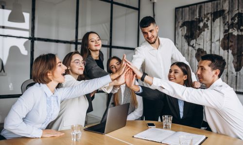 Group of people working out business plan in an office