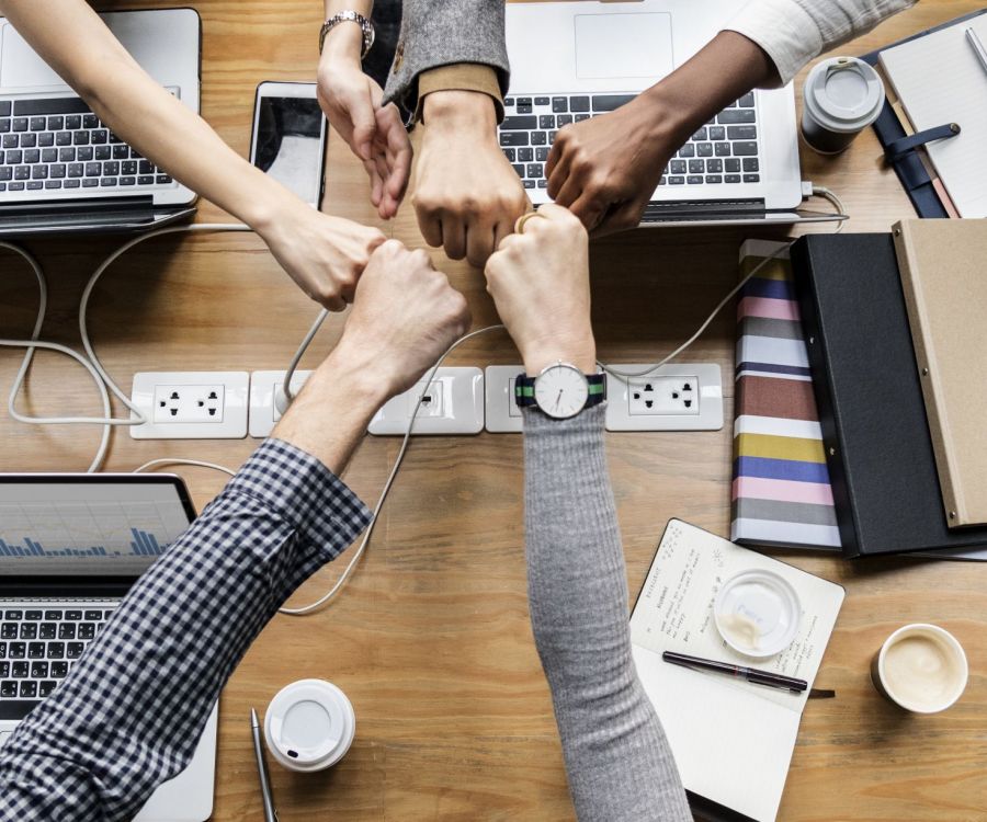 Colleagues giving a fist bump